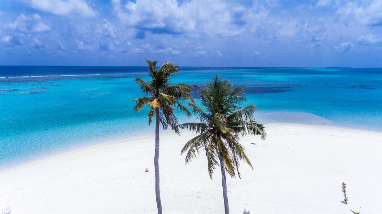 Dhangethi INN Bagian luar foto