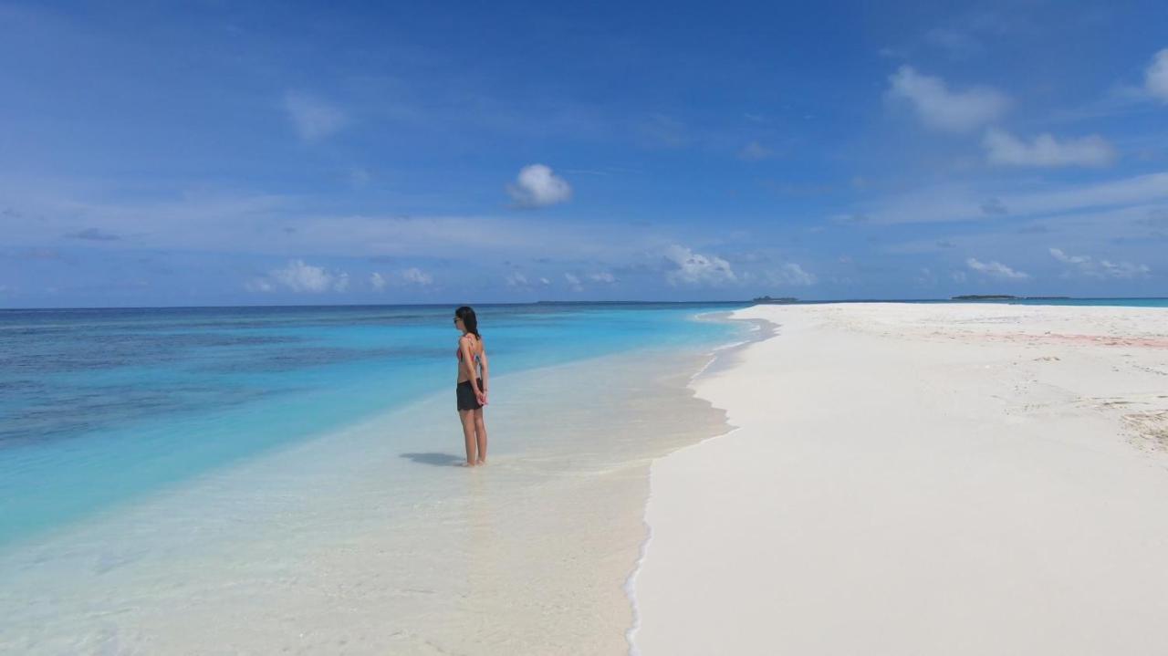 Dhangethi INN Bagian luar foto